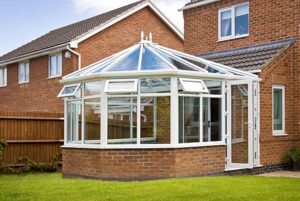 A fully constructed uPVC conservatory with all construction waste removed