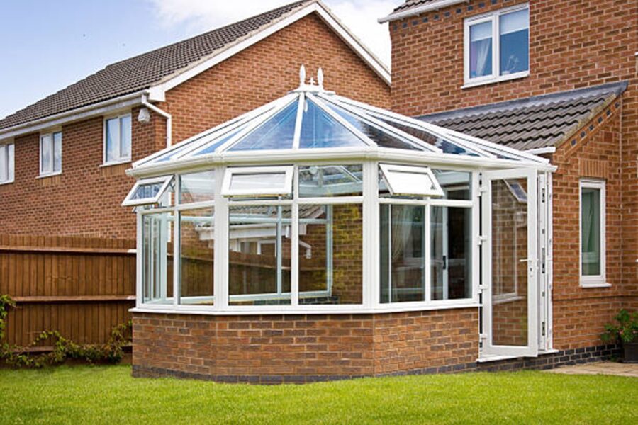 A fully constructed uPVC conservatory with all construction waste removed